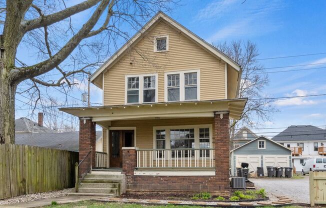 Single-family historic home in West Central with porch and private courtyard.