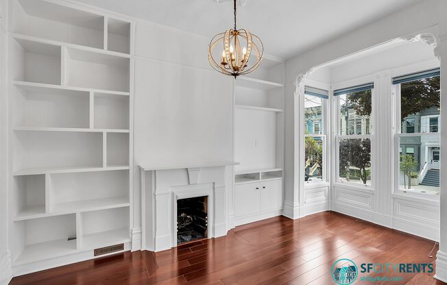 Lower Pacific Heights: Victorian Condo w/ Double Parlor, Shared Yard & EV-Ready Garage Parking