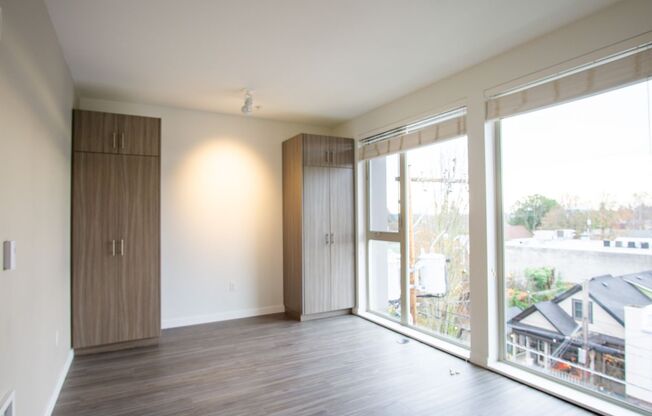Modern + Chic Top Floor Studio Ready Early September!