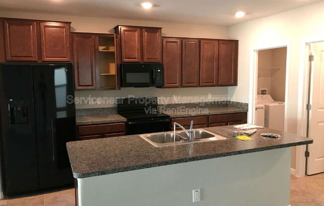 7418 ROSY PERIWINKLE CT