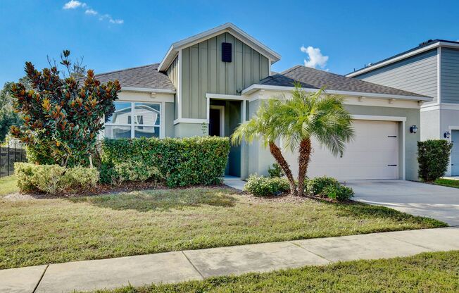 Gorgeous 4/3 Spacious Home with a 2 Car Garage Located on a Conservation Lot in Creekstone Neighborhood – Orlando!