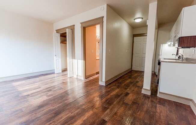 Seattle Apartments - Zindorf Apartments - Studio, Closet, Bathroom, Entryway, and Kitchen