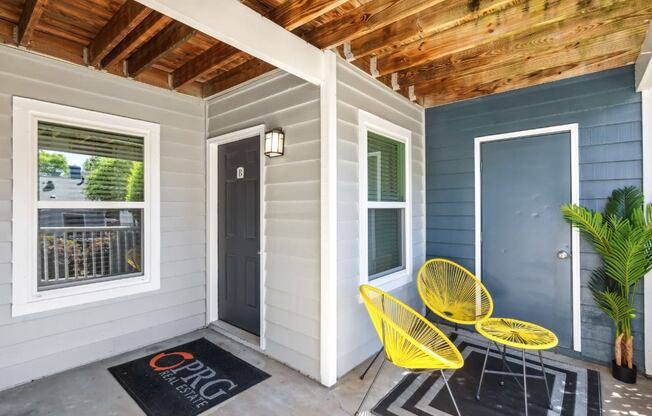 Porch with Chairs at Palmetto Place Apartments, Taylors, 29687