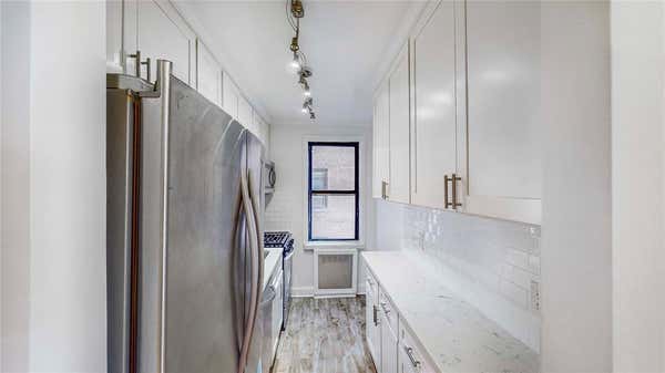 66-15 Wetherole St