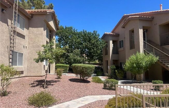 SUNRISE MANOR 1ST FLOOR UNIT IN GATED COMMUNITY!!