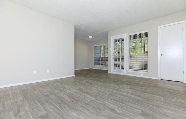 living room and dining room with wooden floors