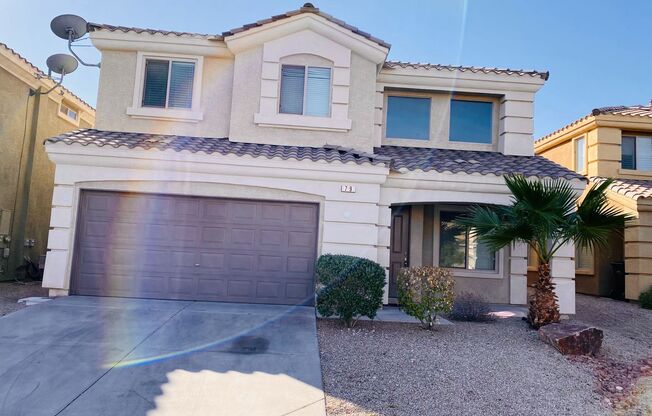 Beautiful & large Rhodes Ranch guard gated community 4 bedroom home with the master bedroom downstairs and a big loft upstairs! With a covered backyard patio. Community features pool, spa, gym, and parks!