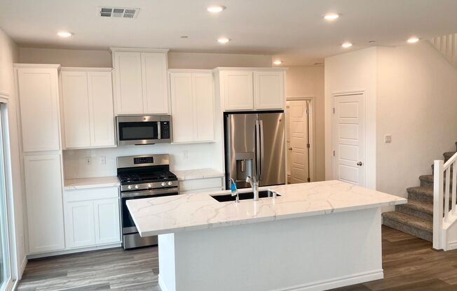 Spectacular new townhome in Henderson - 3 bedrooms + Loft 3 bathrooms modern interior finishes.