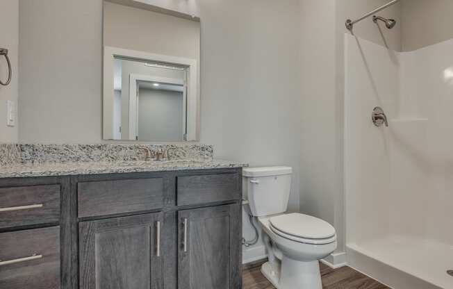 Bathroom With Granite Vanities