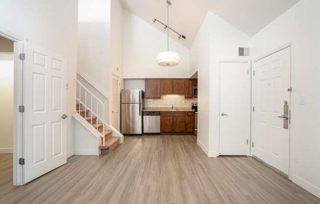 a kitchen and dining area in a 555 waverly unit