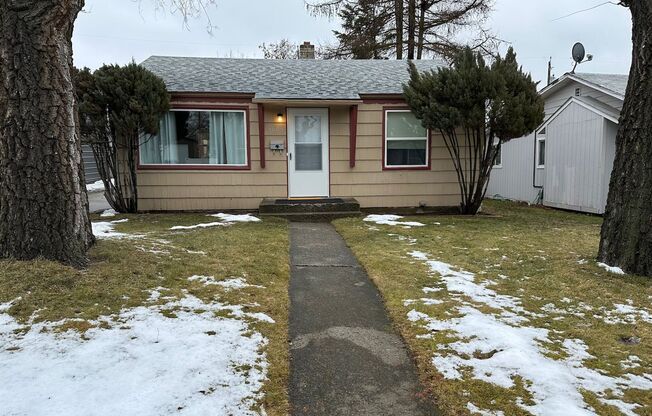 Cozy and Conveniently Located 2 Bed 1 Bath Spokane Home w/ Detached Garage & Heated Multipurpose Room!