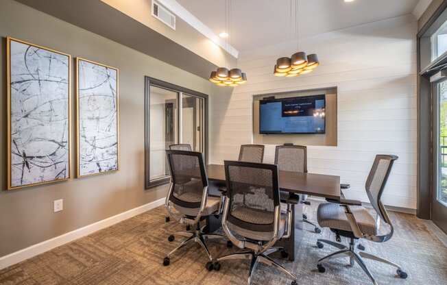 Conference Room With Television at Abberly CenterPointe Apartment Homes by HHHunt, Midlothian, Virginia