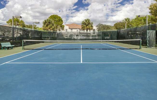 Hamptons on Heron Bay tennis court