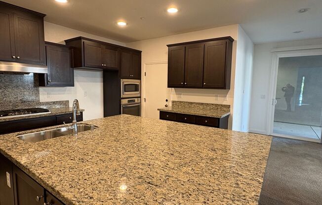 Large 5 bedroom home with loft. Featuring 2 primary bedrooms