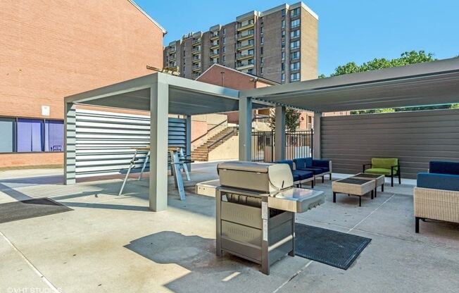 Enjoy the fire pit while you BBQ on our deluxe gas grills at Trillium Apartments, Fairfax, VA