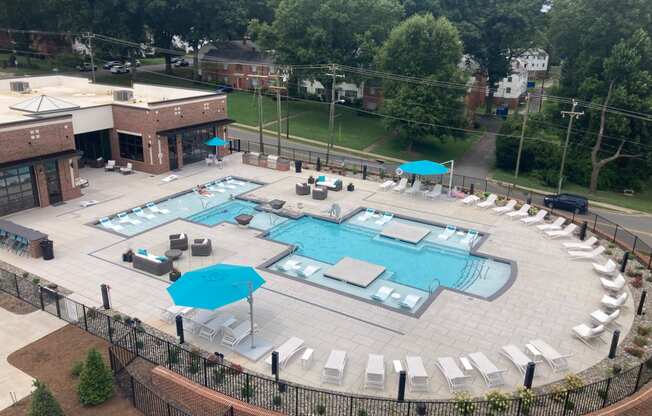 a view of the pool from the balcony of our hotel