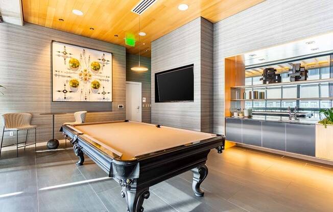 Socialize and unwind in the resident lounge area over a game of billiards while watching the game