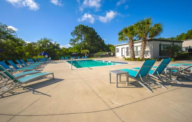 our apartments have a large pool and lounge chairs