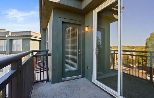 Flatiron West Trade Apartments balcony with sliding doors