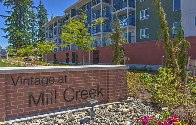 Community Building and sign Vintage at Mill Creek Senior Apartments in Mill Creek WA 98012