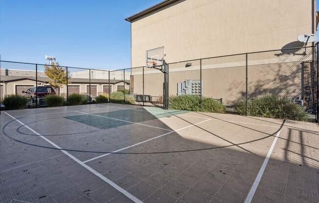 the basketball court at the enclave at university heights apartments ut