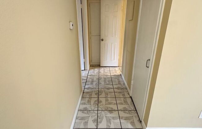 UPSTAIRS 1 BEDROOM CONDO FOR LEASE- GATED COMMUNITY