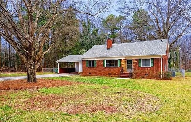 Beautiful full-brick 1-story home set back in a quiet neighborhood yet convenient to shopping/dining and major highways