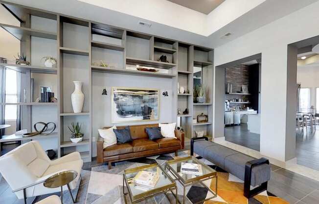 a living room with a couch and a table at Echo Park at Perry Crossing Apartments, Indiana