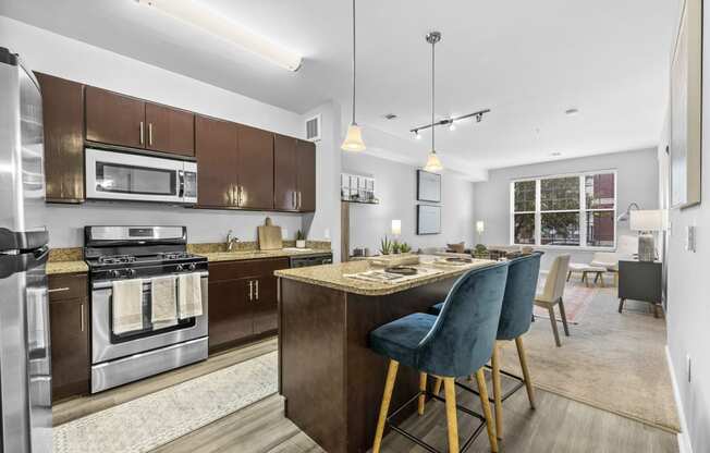 a kitchen and dining area in a 555 waverly unit  at Harbor Pointe, Bayonne, NJ