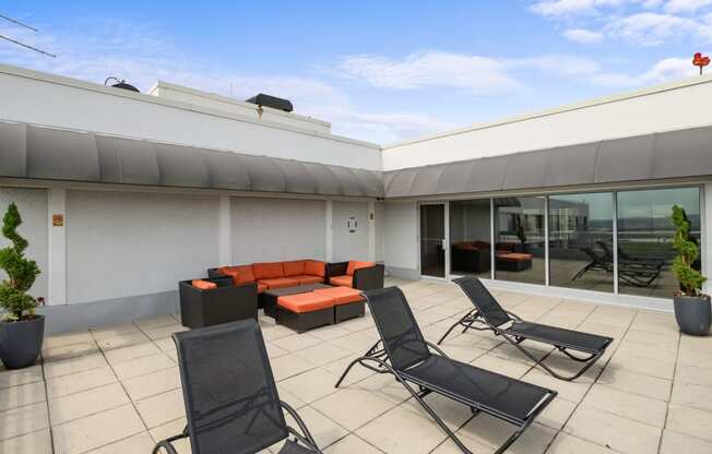 Rooftop deck with lounge chairs at Lenox Club, Arlington, VA, 22202