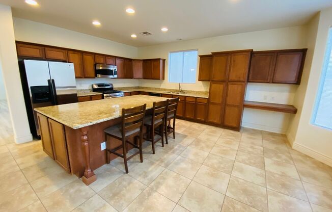 RHODES RANCH GUARD GATED 3064SQFT 5BD 3BA HOME WITH HARD FLOORING THROUGH OUT FOR RENT!