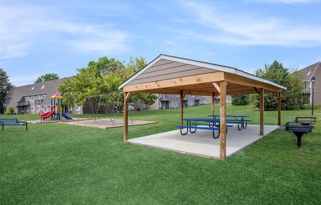 a rendering of a park with benches and a pavilion