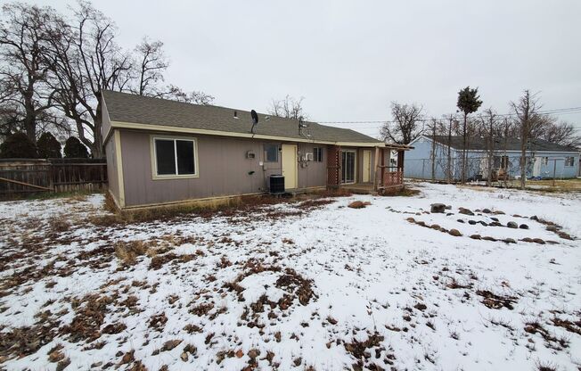 3 bedroom 1 bath home with 1 car garage and fenced yard