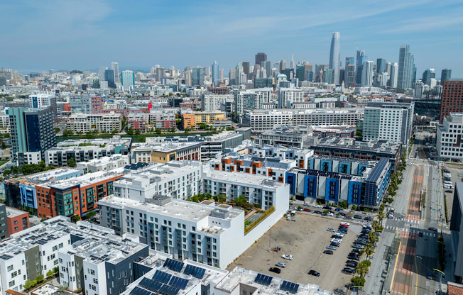 A cityscape with a mix of residential and commercial buildings.