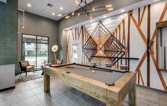 a pool table in the resident lounge at Carrington at Barker Cypress, Texas, 77433