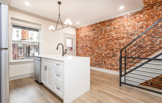 Welcome home to this newly renovated porch front on great west Philly block!