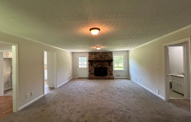 488 Dogwood Trail: 3BD, 2BA ranch home on large lot. Perfectly located just off the intersection of Hwy 74 and Dogwood Trail in Tyrone. Newer Flooring, Newer Paint, Newer Light Fixtures! AVAILABLE NOW!