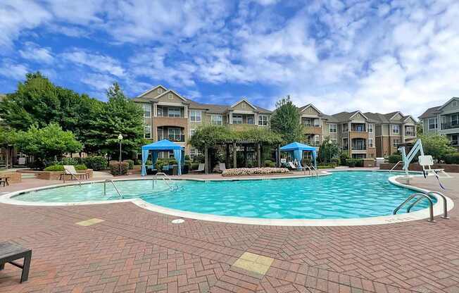 Saltwater pool with sundeck, fire pit, cabanas, WiFi, TV lounge and gas grills