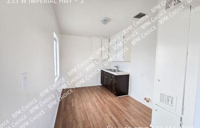 233 W IMPERIAL HWY