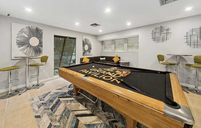 Community Clubhouse Game Tables at Grand Pavilion Apartments in Tampa, FL.