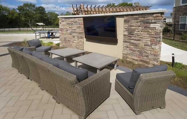 Outdoor living space with gas grills and fire pit