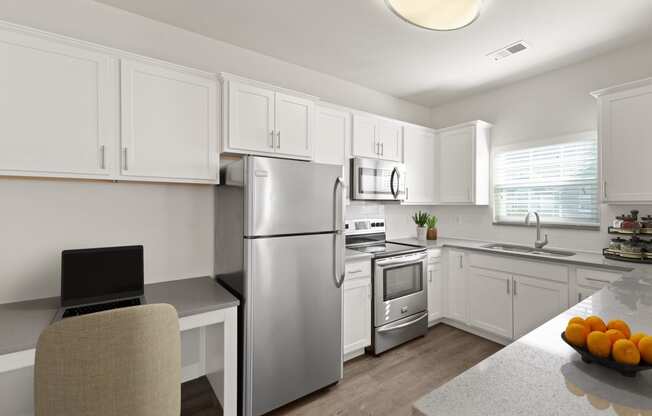 Stainless Steel Appliances and updated fixtures in kitchen