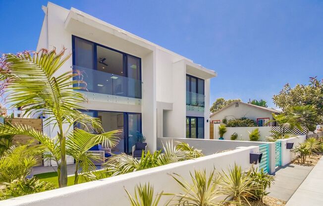 Luxury Coastal Townhome | Private Rooftop + Private Garage | Steps to the Beach