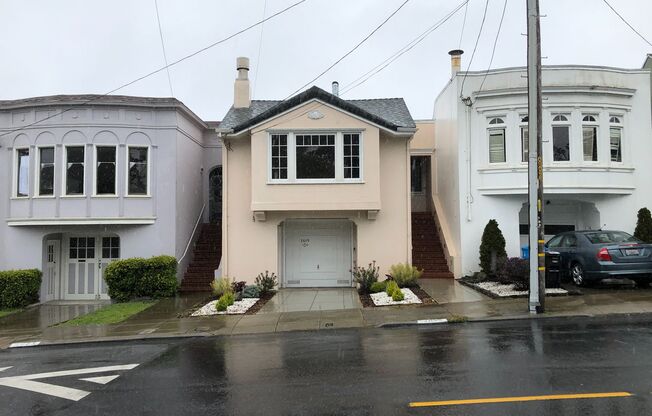 Classic Sunset single family home w/bonus sunroom and dining room for office/nursery with huge yard & garage!