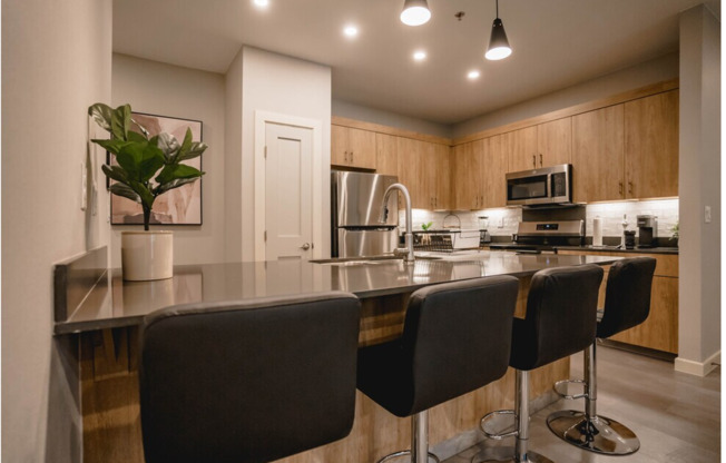 2 beds, 2 baths, 1,037 sqft, $1,225, Unit B-04/WHITE CABINET/ PARKING LOT VIEW