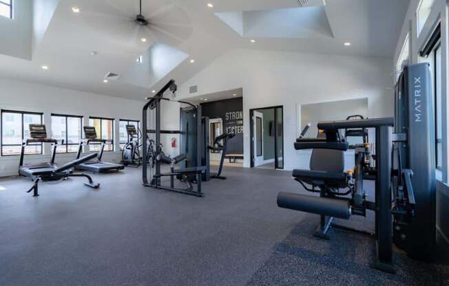 an empty room with rows of chairs and a wall with a shark at Sonder Fields in Happy Valley, OR