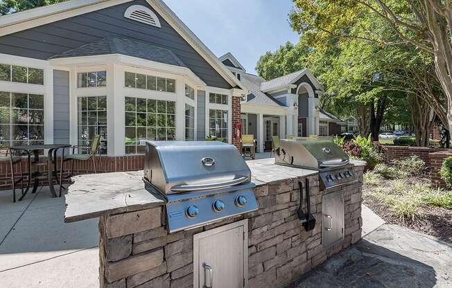 Outdoor Grilling Area at The Village Apartments, Raleigh, NC, 27615