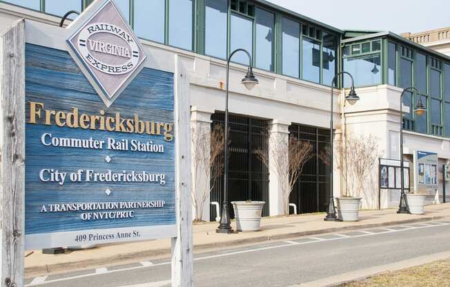 a sign in front of a building