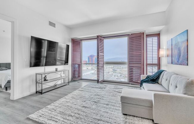 High-Rise Living: 2-Bedroom Retreat with Strip Views