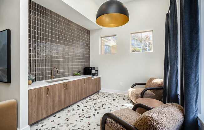 A modern bathroom with a sink, a mirror, and a shower.